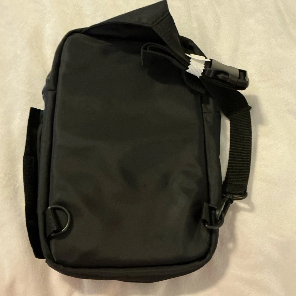 Sling backpack.New DSW